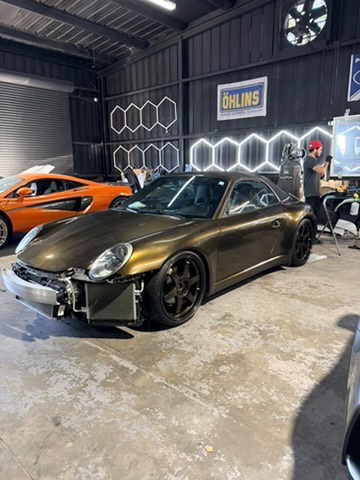 Front end stripped for edges. Porsche 911, colour shift film. Corsa Automotive, Orlando.