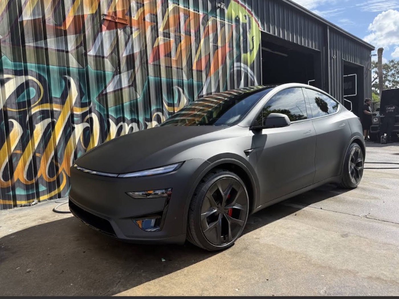 Satin black. Tesla Model Y. Corsa Automotive, Orlando.